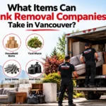 Haultra Junk Removal truck and workers collecting furniture, appliances, household items, yard waste, construction debris, mattresses and scrap metal in Vancouver.